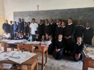 George Omer Nalo with Students in Tanzania